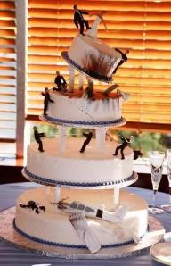I don't know about you but this wedding cake contains all sorts of things that no wedding cake should have. I mean its supposed to be a happy occasion, not set to the scene of some action movie with plane crashes, gunfights, and blood everywhere.