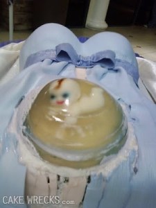 Honestly, who's idea was this nightmarish disaster? I mean the cake has a baby in a gelatin stomach on it. This is creepy beyond all reason. 