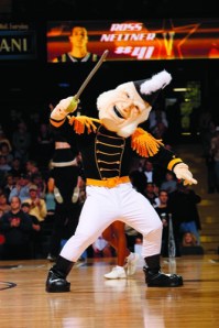 Let's see, who's idea for a college mascot consisted of a crusty mutton chop old guy in 19th century naval attire? This guy is simply terrifying, especially since he's holding a big stick he intends to whack any player who doesn't play to his specifications.