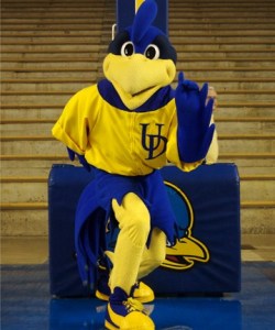 Now I know Delaware's state bird is a blue hen. But really, I think YouDee seems to be more appropriate for a box of LSD laced Kelloggs Cornflakes than as a mascot at sporting events. Oh, and YouDee is supposed to be a male instead of an actual hen which is female. And that the blue hen was used in cockfighting. Seriously, Delaware?