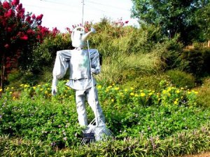 Of course, unlike his famous brother from The Wizard of Oz, Watering Can Man works in the landscaping business as shown by his gardening implements.