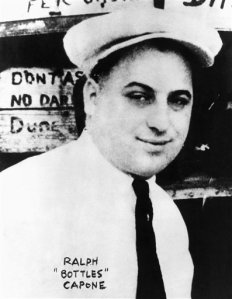 Now he doesn't seem to resemble Herc from The Wire at all who plays him on the show. Reminds me more of Al Capone if he ever became a milkman in a newspaper cap. You can see the family resemblance there.