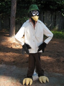 Sure it's cute and sharp dressed. However, I hopes it's not one of the racist crow caricatures from Dumbo. You don't want any unfortunate implications there.