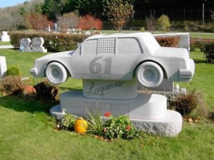 Well, I got to say that this is the most expensive tombstone for a race car buff I've ever seen. Of course, this grave might belong to a race car driver which is more understandable.