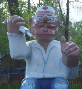 Now why in the hell would anyone have a playground figure like this? I mean there are adults terrified of needles, let alone kids. Horrifying indeed.