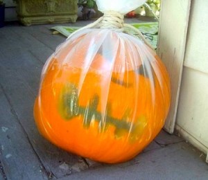 Is it just me or does it just seem like a depiction of a jack-o'-lantern drowning or suffocating? Either way it's pretty bad since people have been killed through plastic bags.