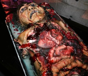 Makes a lot of the cakes in my baby shower cake post seem less gruesome in comparison. And if it weren't for the cartoonish face, I would've thought it came from the morgue.