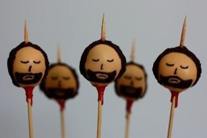Now I know these aren't real severed heads. Yet, who's sick and twisted idea was it to make treats with impaled heads?