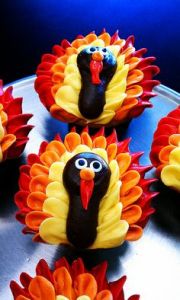 Just a bunch of cupcakes decorated with red, orange, and yellow icing. Still, quite cute.