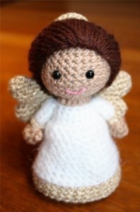 I've seen a lot of angel amigurumi on Google Images. Of course, the biggest disadvantage of having them as a tree topper is that they don't light up. Yet, that may be easily remedied.