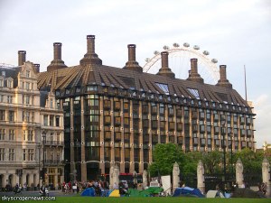 Actually it's the Portcullis House in London, which was built to provide offices for members in the UK Parliament. Yet, it seems to resemble some hideous Victorian mansion and factory complex from a Charles Dickens novel.