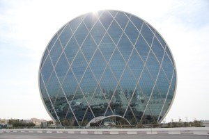This is the Aldar Headquarters Building of Abu Dhabi, UAE. It's supposed to be the world's first circular skyscraper. Still, it may cause migraines while looking at it on a warm sunny day and resembles a fly's eye.