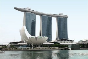 Unfortunately, Signapore's Marina Bay Sands Hotel resembles a giant surfboard or an upturned subway on very thick metallic stilts. 
