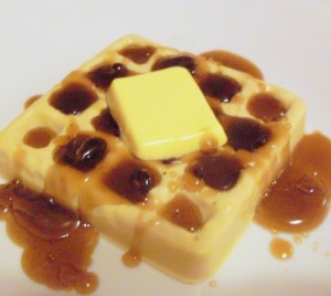Yes, this is waffle soap. And no, I'm not sure if it tastes like maple syrup. That, or whether the maple syrup on that is actually solid soap.