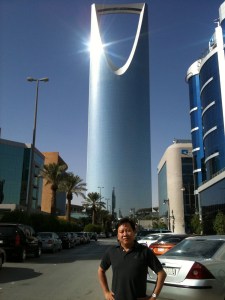 This is Riyadh's Al-Mamlakah Tower and Kingdom Centre. It's the most famous building from the city as well as hotel and shopping mall. Also, lights up at night. 