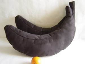 I'm sure the person who made these was planning on doing banana pillows but couldn't find any yellow fabric. So he or she probably settled with black instead. Still, rather disgusting if you know what I mean.