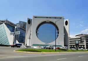 It's called "La Lavadora" or "the Washing Machine" in the heart of Mexico City's business district. Also lights up and features a pyramid. Still, "washing machine" makes better sense.