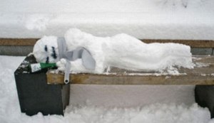 Wait a minute, aren't snowmen supposed to be outdoors anyway? Then again, this guy's sleeping on a park bench so he probably doesn't have a yard to stand in.