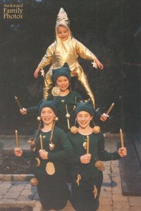 Because what other family would you expect to stack up their kids to pose as a Christmas tree? Yet, they seem to be very happy about it though.