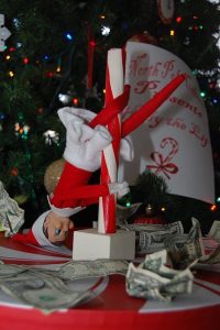 Well, Holly needs to supplement her income somehow. She can't live on the meager Elf on the Shelf salary she's been receiving and her male co-workers are paid in so much more.