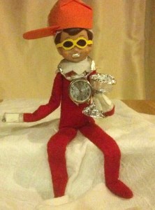 Crinkles didn't choose the thug life, the thug life chose him. Still, he seems decked in aluminum bling with a cup and a grill to match with the watch around his neck.