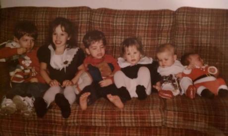 Here's a picture of me with my sister and cousins at my grandparents' house during Christmas of 1994. Here I am pictured between my cousins Frank and John while my sister Molly is seated near my cousins Kerry Ann and Josh.