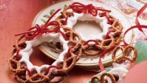 Seems like white chocolate and Twizzlers can hold almost anything together. However, I wouldn't recommend pretzel wreaths as a stuffing stuffer. They may be too delicate.