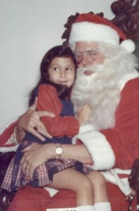 "Ho, ho, ho, Santa needs a break from this, really. How many more kids do I have to pose with before I pass out?"