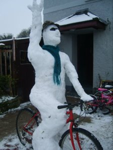 Yet, I have no idea how this guy is wearing a summer camo hat and sunglasses on a cold cloudy day. Then again, he's a snowman.