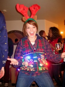 Now this girl looks very excited rocking in her lit up Christmas sweater vest. I also wonder what's in that cup she's holding. Still, I wouldn't be caught dead acting like that at my Aunt Mary's place on Christmas Eve.