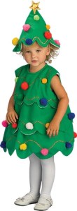 Of course, this little angel is thinking, "why did mommy and daddy have me dress in this stupid tree costume? Everyone at Grandma's house is going to laugh at me."