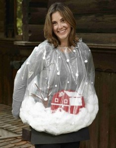 Yet, this woman seems to deck her outfit with a winter scene enclosed in a plastic bag with some cutouts for a barn and tree as well as lots and lots of cotton.