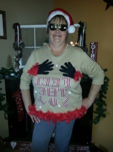 Yet, when a woman is wearing a Christmas sweater reading, "Feel the Joy" and has two black hands on her chest, I don't think you want to abide.