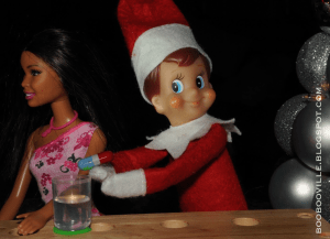 Oh, my God, is he sneaking a roofie in her drink? Seriously, Mingles is lucky that he's not at the North Pole right now or Santa would have his ass.