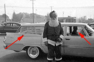 Sure he may be Santa Claus or some known sicko dressed up as Santa Claus to lure children with free candy. Either way, I wouldn't risk it and keep the hell a way from him.