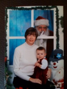 Okay, the concept of posing with your kid while Santa watches out the window is actually rather terrifying if you ask me.