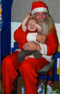 And from how that baby's acting up, I'm sure this Santa certainly smells like a homeless guy. But at least this Santa didn't have to grow a beard.