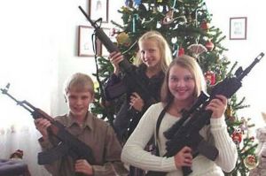 Actually for the love of God, don't ever give your children guns for Christmas, let alone assault rifles. Still, these children seem like they're out to cause a neighborhood shooting spree.