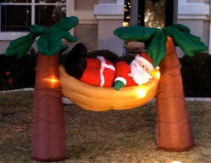 Now I don't know about you but doesn't it seem a bit odd that Santa is still in his red suit? I don't mean to be rude, but if Santa doesn't strip out of that big red winter suit anytime soon, he might as well be rushed to the hospital for heatstroke. That, or sweating like hell.