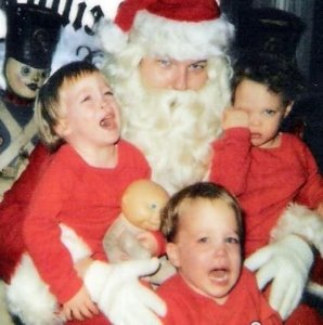 Sometimes, it's Santa visits like this that will forever live in these children's nightmares. Still, this Santa seems like he wants to do very naughty things to these innocent souls in his workshop.