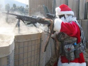 Granted, he's most likely an American soldier playing Santa during his tour of duty who's recently besieged by combat. But still, this is pretty damn funny.