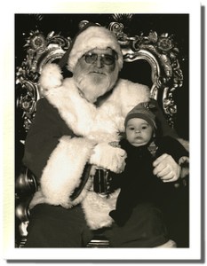 I haven't seen The Big Lebowski, but I'm sure things aren't going to be good if this baby's father is The Dude. Still, this Santa looks as if he has a score to settle.