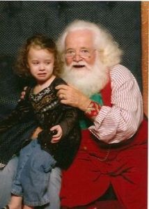 I don't like the look on that Santa's face and neither does the girl on his lap. In fact, she wishes she wouldn't want to sit on Santa's lap anymore.