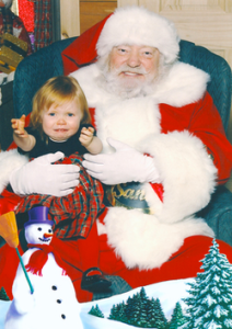Little Girl: "Mommy, get me off this scary man's lap! I'll be good, honest I will! Just get me out of here! Please don't force me to sit on his lap, please!"