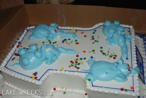 Oh, my God, have I ever seen a first birthday cake so depressing as this? I mean the elephants on this cake look as if they're all dead. Seriously, a first birthday cake is no platform to protest the black market ivory trade that funds terrorism and hurts the environment. Jesus Christ, what the fuck is wrong with this decorator?