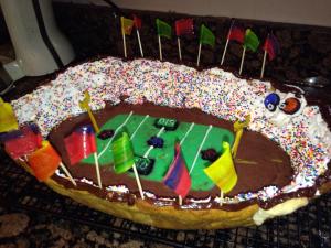 With cookie crusts, icing stands with sprinkles, fruit roll-up flags, and pudding turf, I'll take it. Now I'm sure those sprinkles had very expensive seats because Super Bowl tickets aren't cheap.