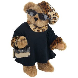 Now I don't know what consists of high fashion these days. However, I'm not sure if Coco's fur hat and trim is necessarily 