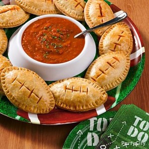 Now compared to the other gameday delights, these calzones and tomato sauce actually resemble something like a gourmet meal. You know, like what you'd see on a cooking show or a recipe book.