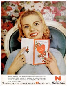 Excuse me, does she have stars in her eyes? Or is she really a lifeless fem-bot from the Stepford suburban community? You know the one that killed all those housewives and replaced them with look alike robots who'd do anything to please their husbands? Freaky.