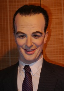 For God's sake, what's the hell with this guy's humongous head? Seriously, I've never seen anyone with a forehead that high. Not to mention, that smile is terrifying.